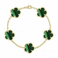 gold green bracelet
